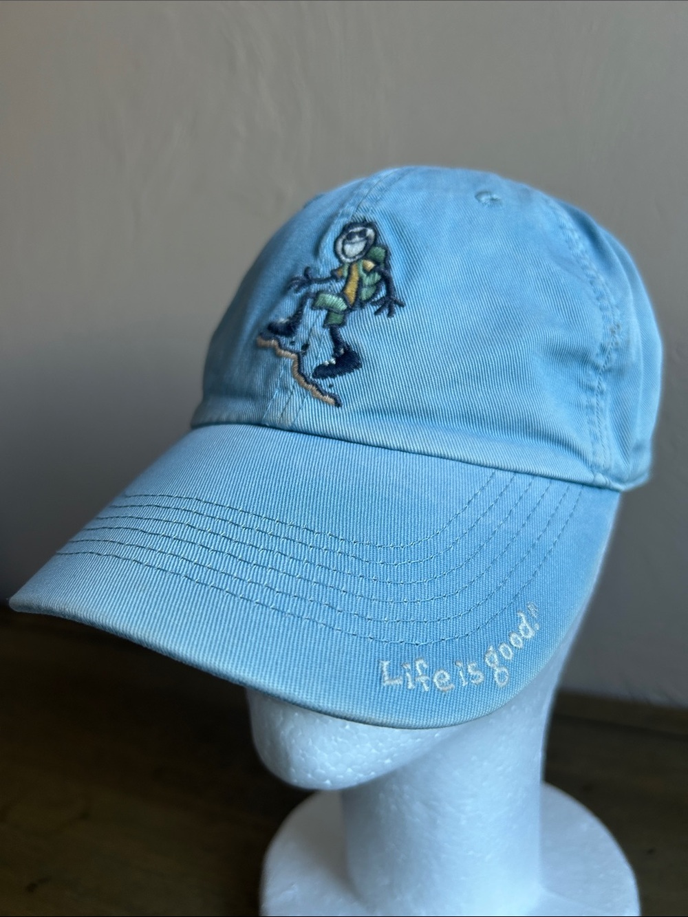 Life is Good Light Blue Dad Hat Features The Brands Iconic Mascot, Jake’s Hiking